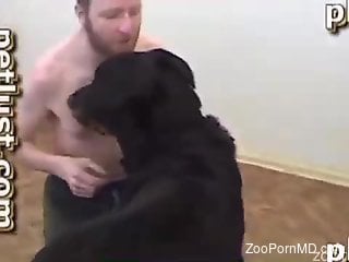 Bearded hunk gets his tight butthole banged by a dog